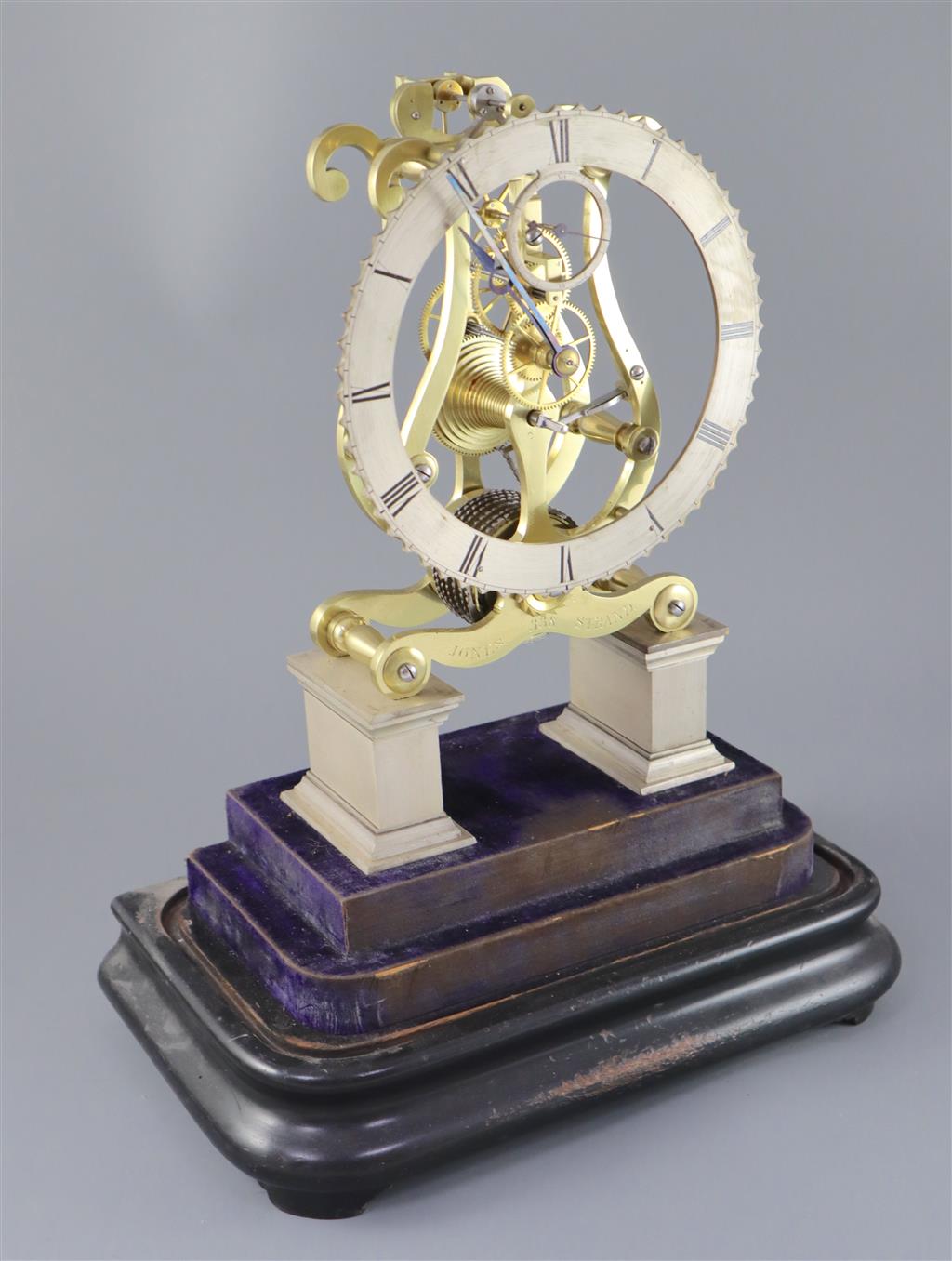 Jones, Strand. An early Victorian brass skeleton clock, clock height 12in. height with plinth 16.5in. height with dome 20in.